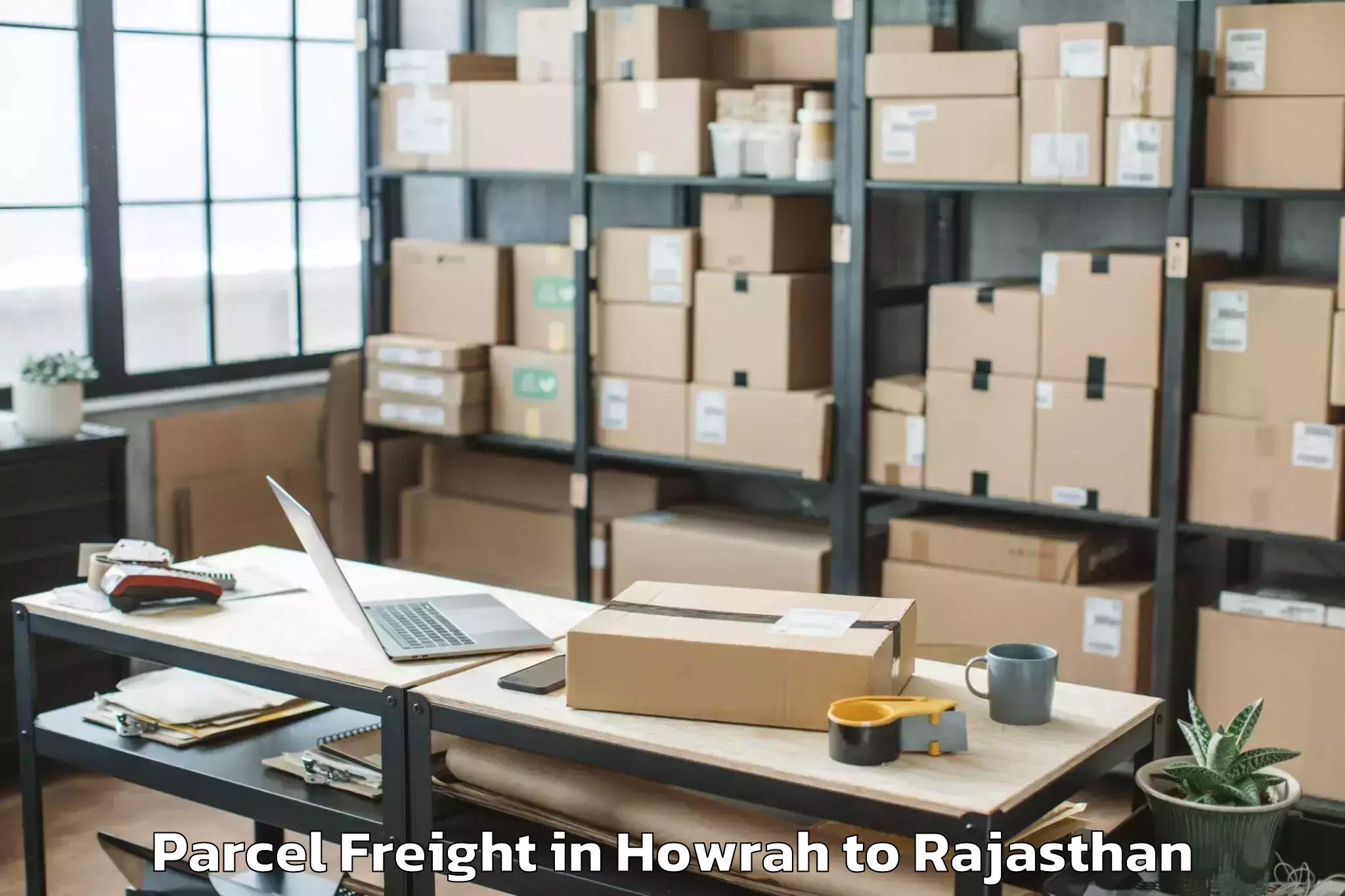 Book Your Howrah to Mewar University Chittorgarh Parcel Freight Today